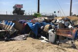 There are many homeless encampments in Hanford and Kings County similar to this one. Hanford Police Officer Mark Carrillo showed this photo, and others, to a consortium of agencies and individuals interested in creating a homeless service center.